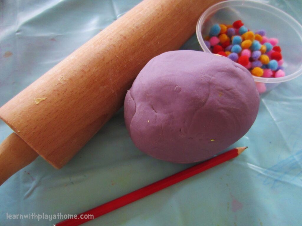Learning Numbers with Playdough and Pompoms learn
numbers, number activity